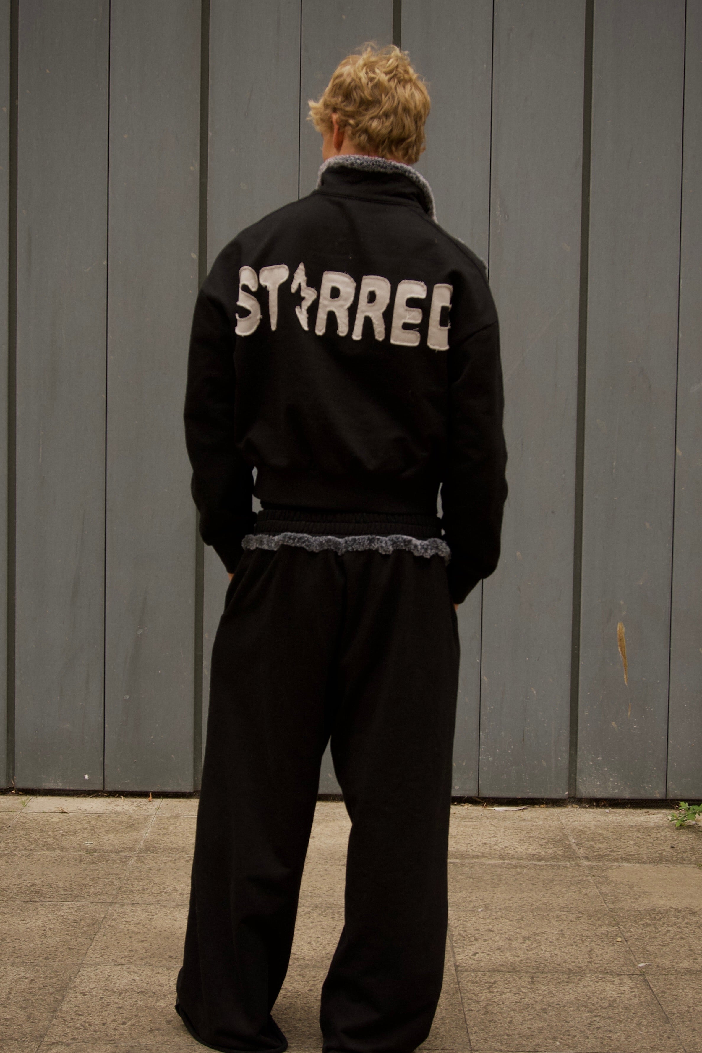 Black STARRED zip up jumper